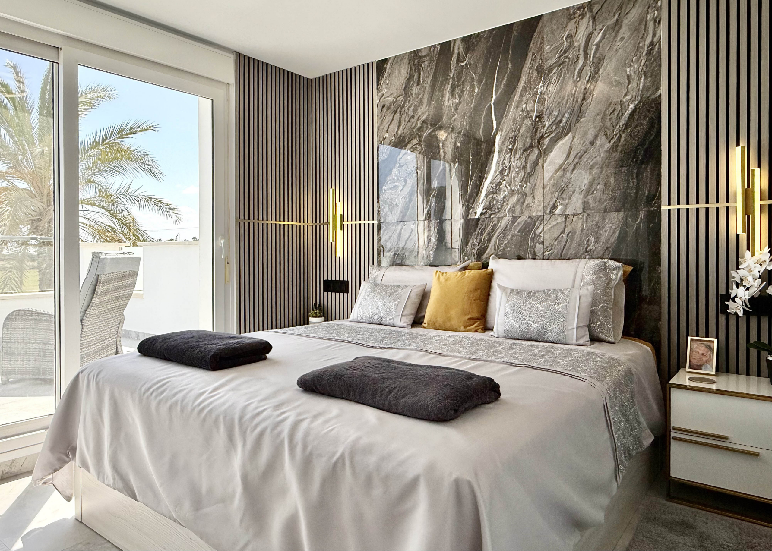 Luxury master bedroom with private terrace in Calblanque Villa at Mar Menor Golf Resort