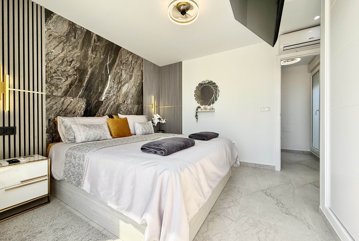 Luxury master bedroom with private terrace in Calblanque Villa at Mar Menor Golf Resort