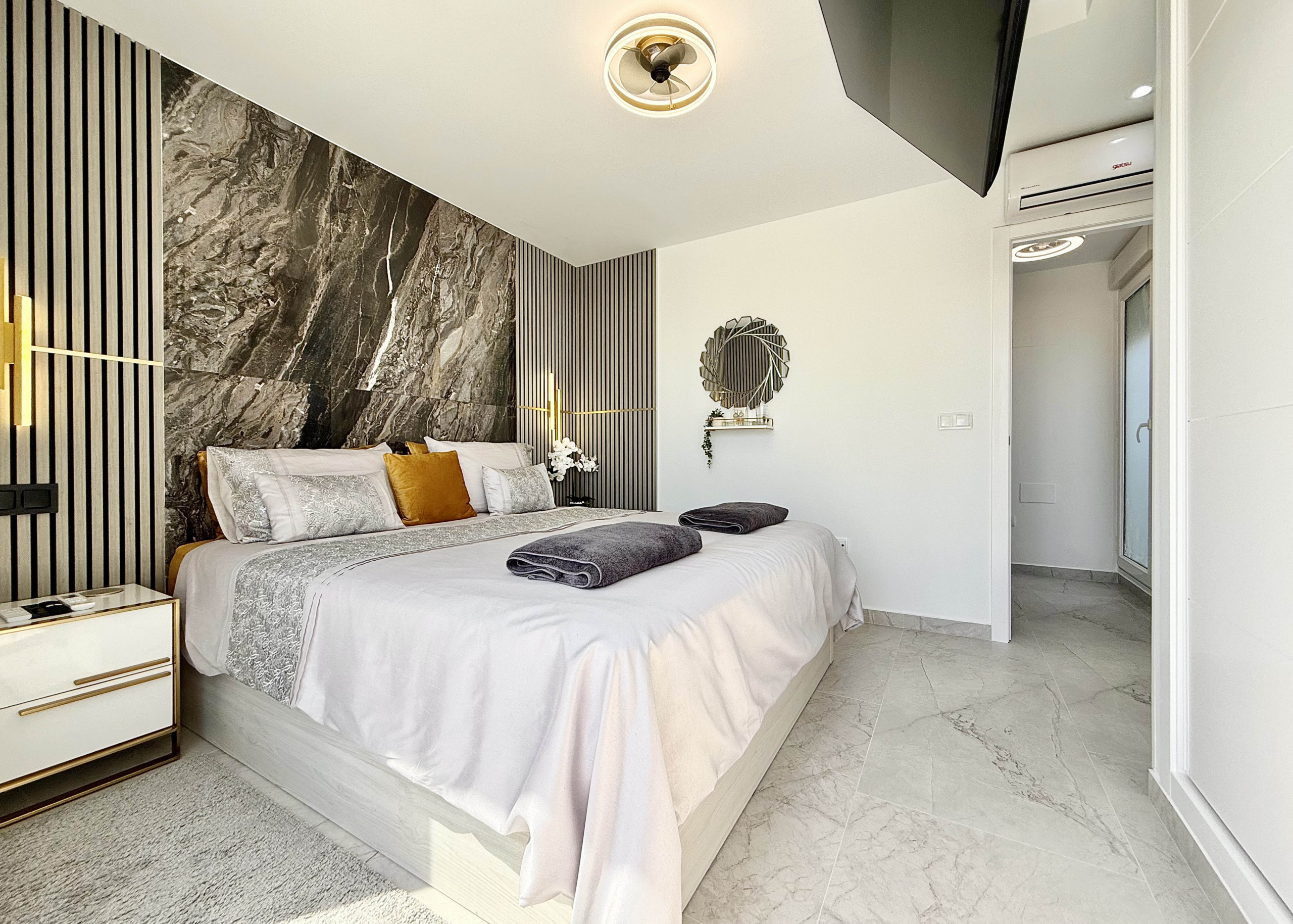 Luxury master bedroom with private terrace in Calblanque Villa at Mar Menor Golf Resort