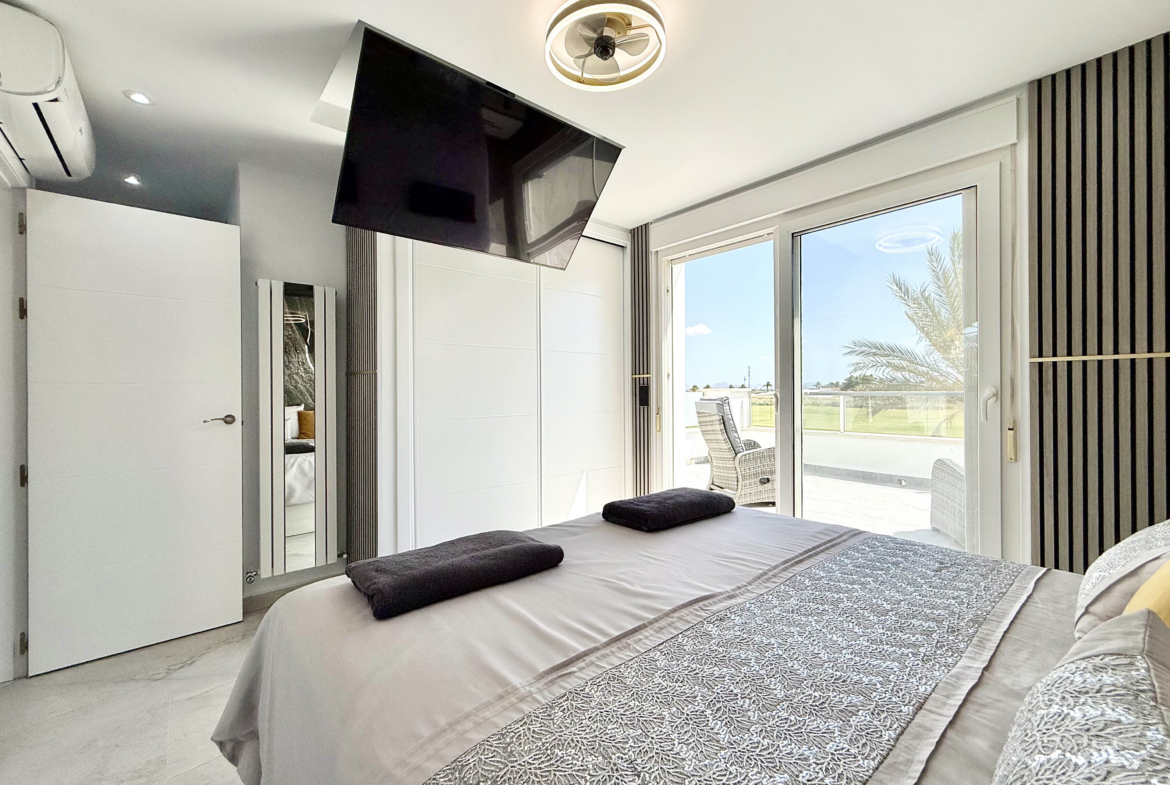Luxury master bedroom with private terrace in Calblanque Villa at Mar Menor Golf Resort