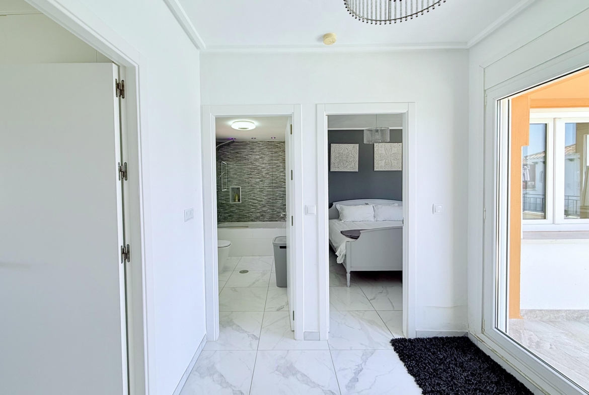 Bright first-floor landing connecting bedrooms and bathroom in Isla Grosa Villa on Mar Menor Golf Resort by Levante Properties