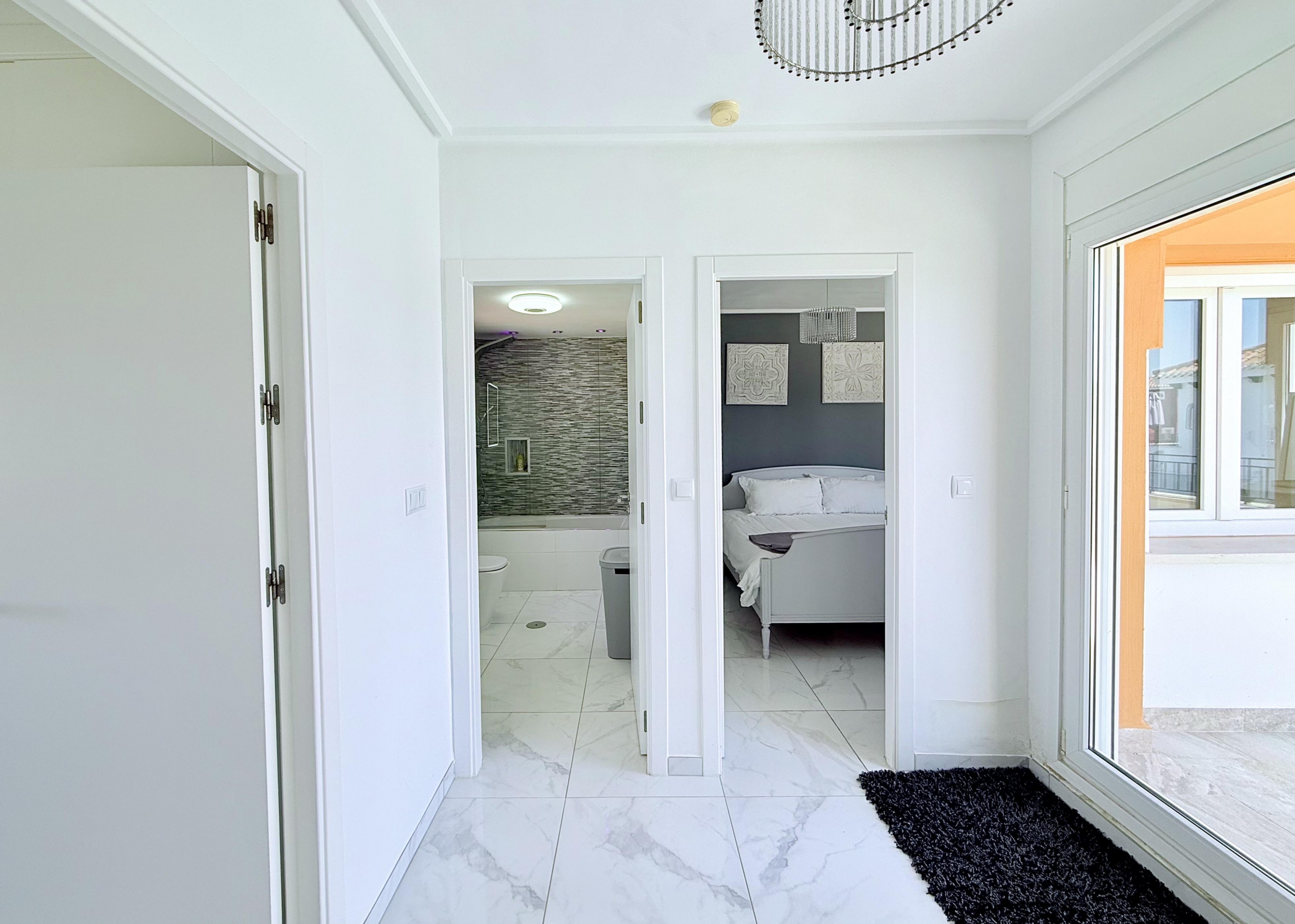 Bright first-floor landing connecting bedrooms and bathroom in Isla Grosa Villa on Mar Menor Golf Resort by Levante Properties