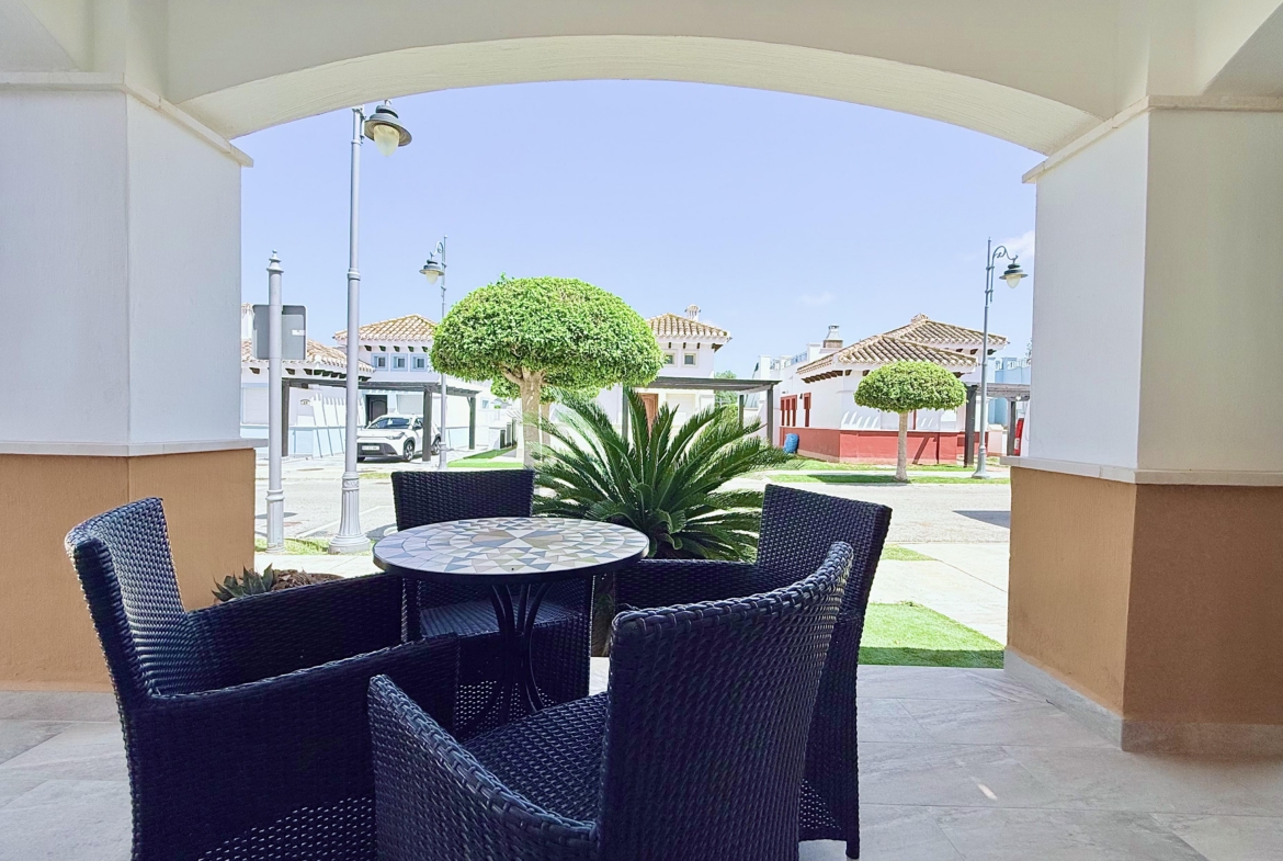 Private patio accessed from the open-plan lounge at Isla Grosa Villa on Mar Menor Golf Resort by Levante Properties