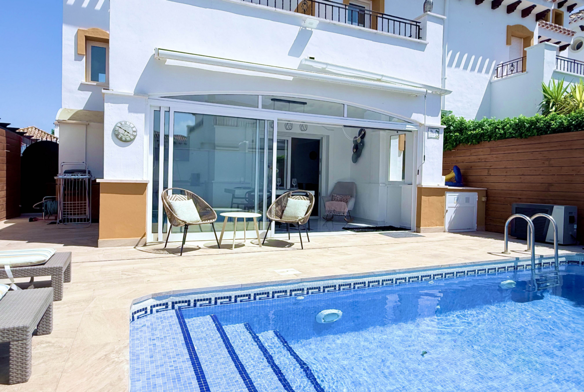 Heated swimming pool at fully renovated Isla Grosa Villa for sale on Mar Menor Golf Resort by Levante Properties
