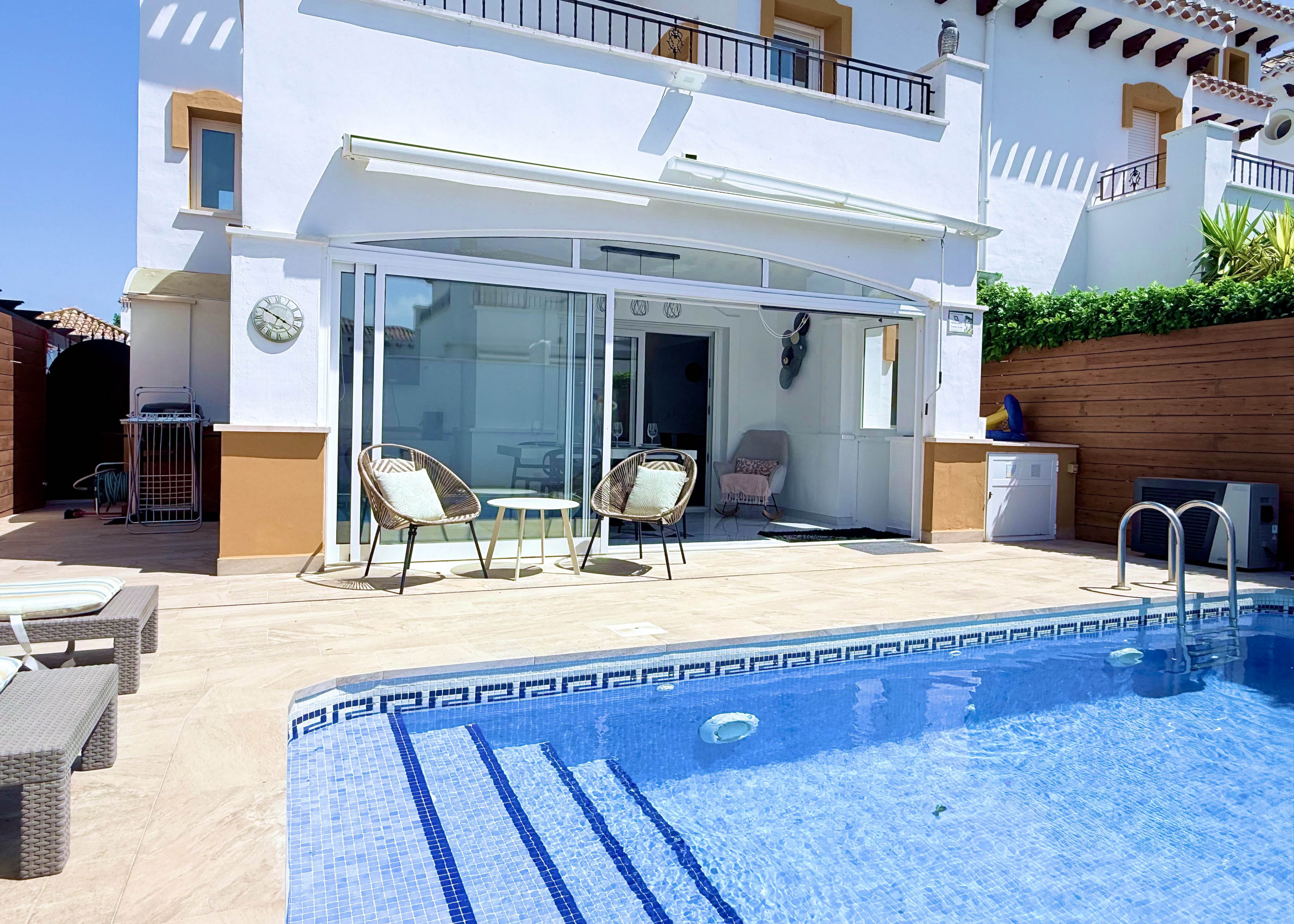 Heated swimming pool at fully renovated Isla Grosa Villa for sale on Mar Menor Golf Resort by Levante Properties