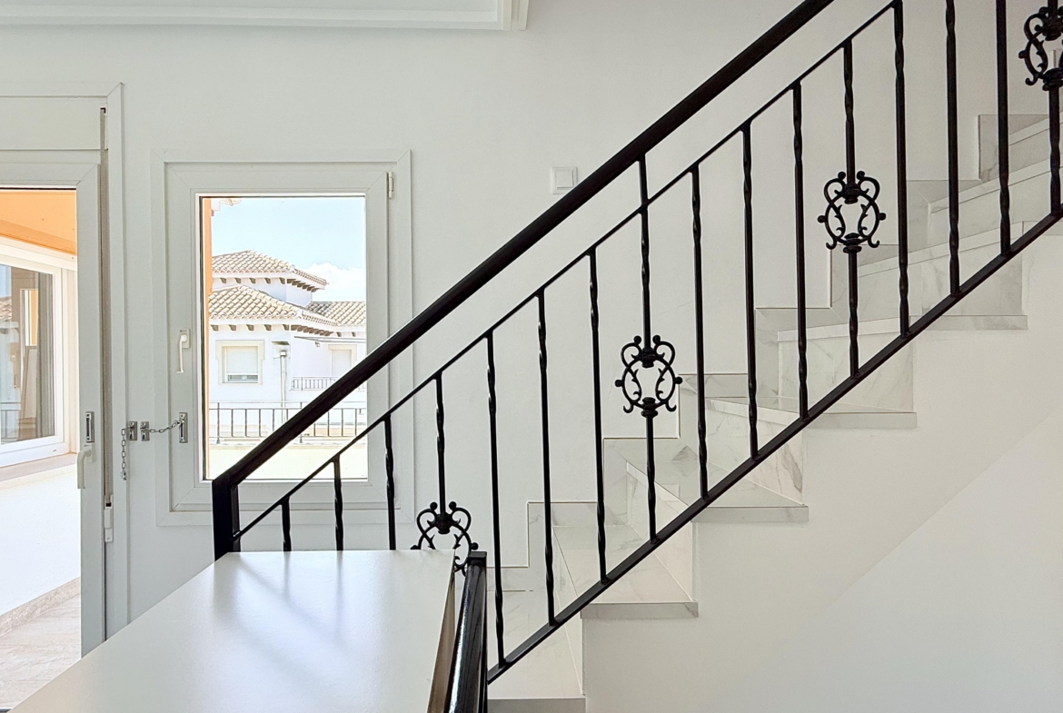 Staircase leading to converted tower room in Isla Grosa Villa on Mar Menor Golf Resort by Levante Properties