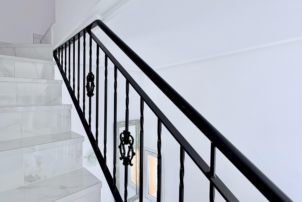 Staircase leading to converted tower room in Isla Grosa Villa on Mar Menor Golf Resort by Levante Properties