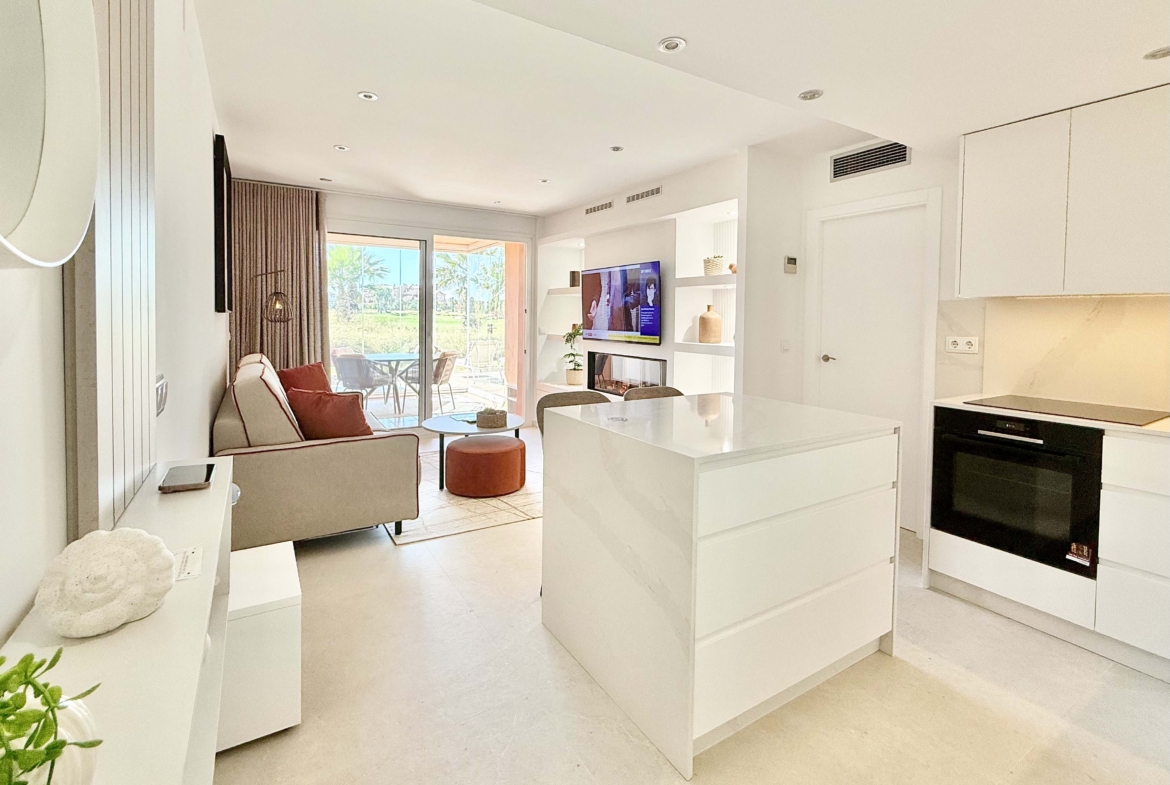 Modern living room in an upgraded one-bedroom apartment for sale on Mar Menor Golf Resort with golf views, exclusively marketed by Levante Properties.