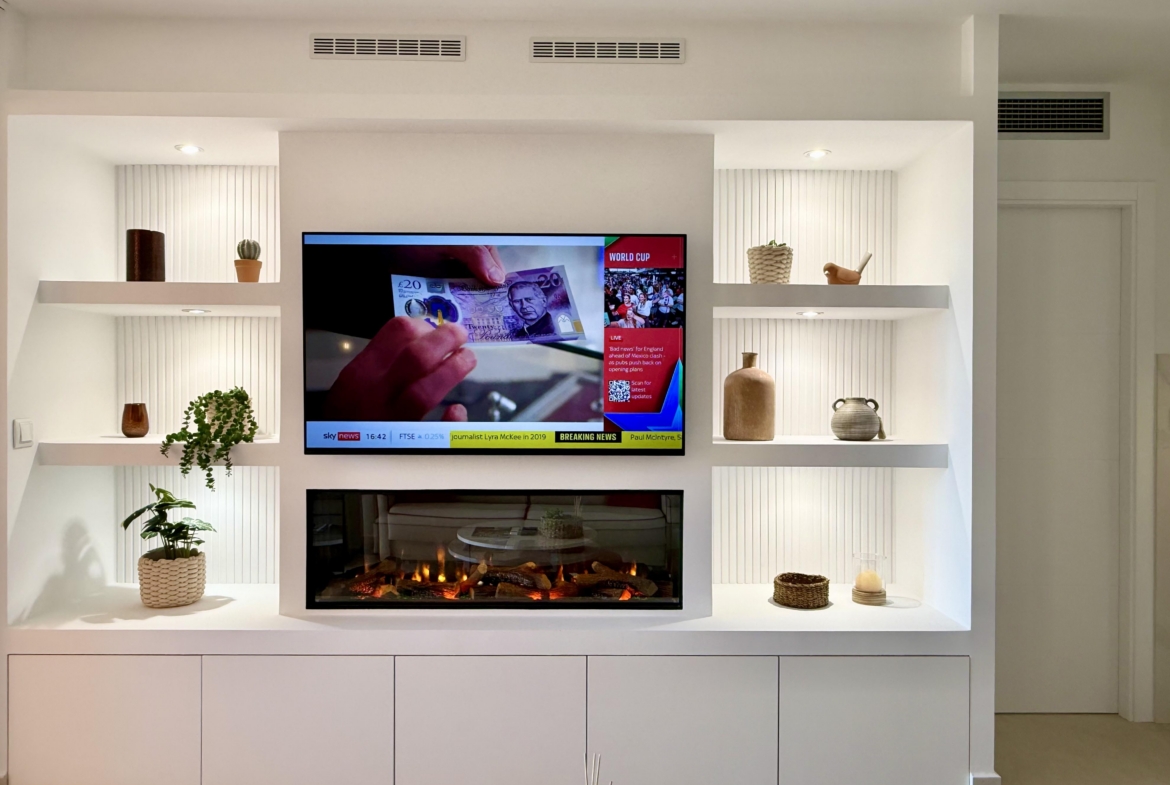 Modern living room in an upgraded one-bedroom apartment for sale on Mar Menor Golf Resort with golf views, exclusively marketed by Levante Properties.