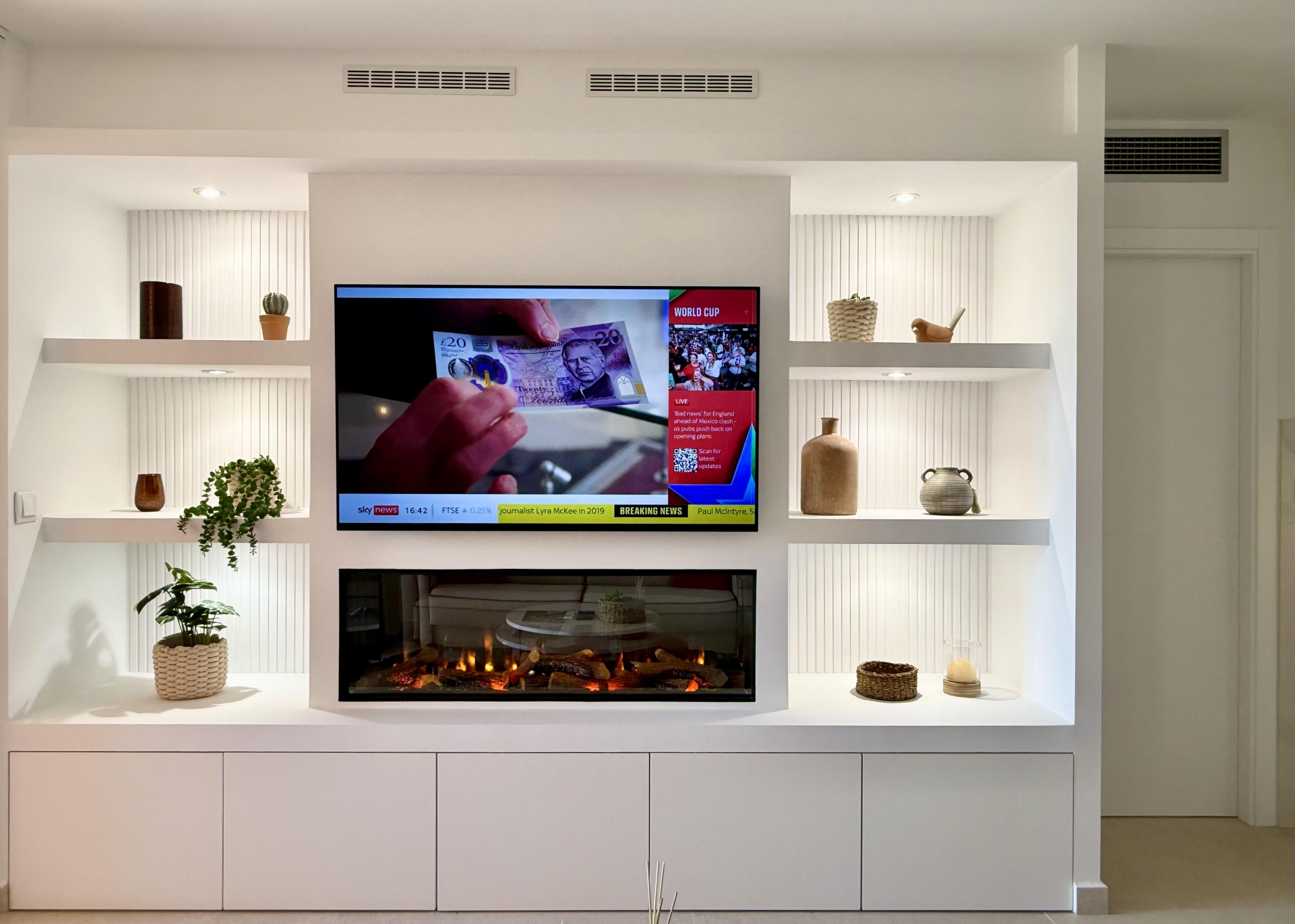 Modern living room in an upgraded one-bedroom apartment for sale on Mar Menor Golf Resort with golf views, exclusively marketed by Levante Properties.