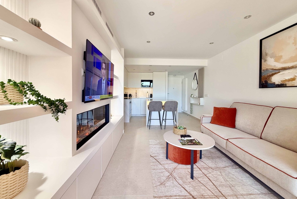 Modern living room in an upgraded one-bedroom apartment for sale on Mar Menor Golf Resort with golf views, exclusively marketed by Levante Properties.