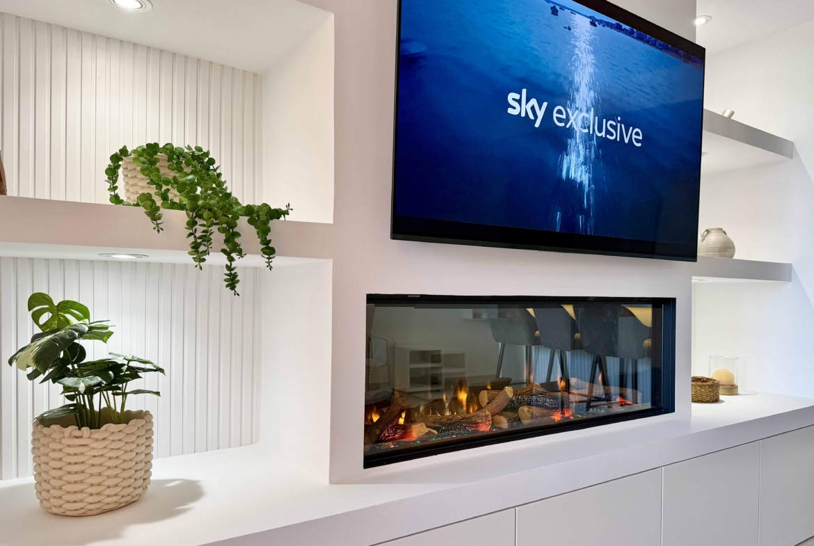 Modern living room in an upgraded one-bedroom apartment for sale on Mar Menor Golf Resort with golf views, exclusively marketed by Levante Properties.