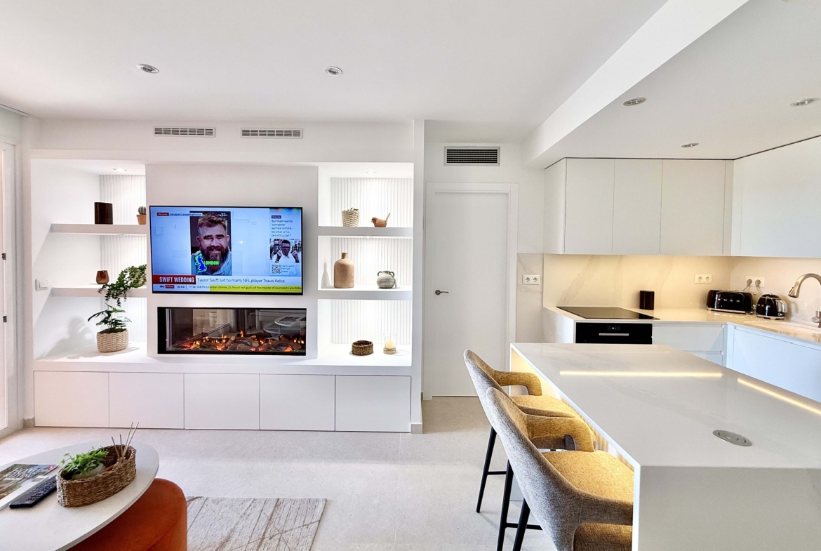 Modern living room in an upgraded one-bedroom apartment for sale on Mar Menor Golf Resort with golf views, exclusively marketed by Levante Properties.