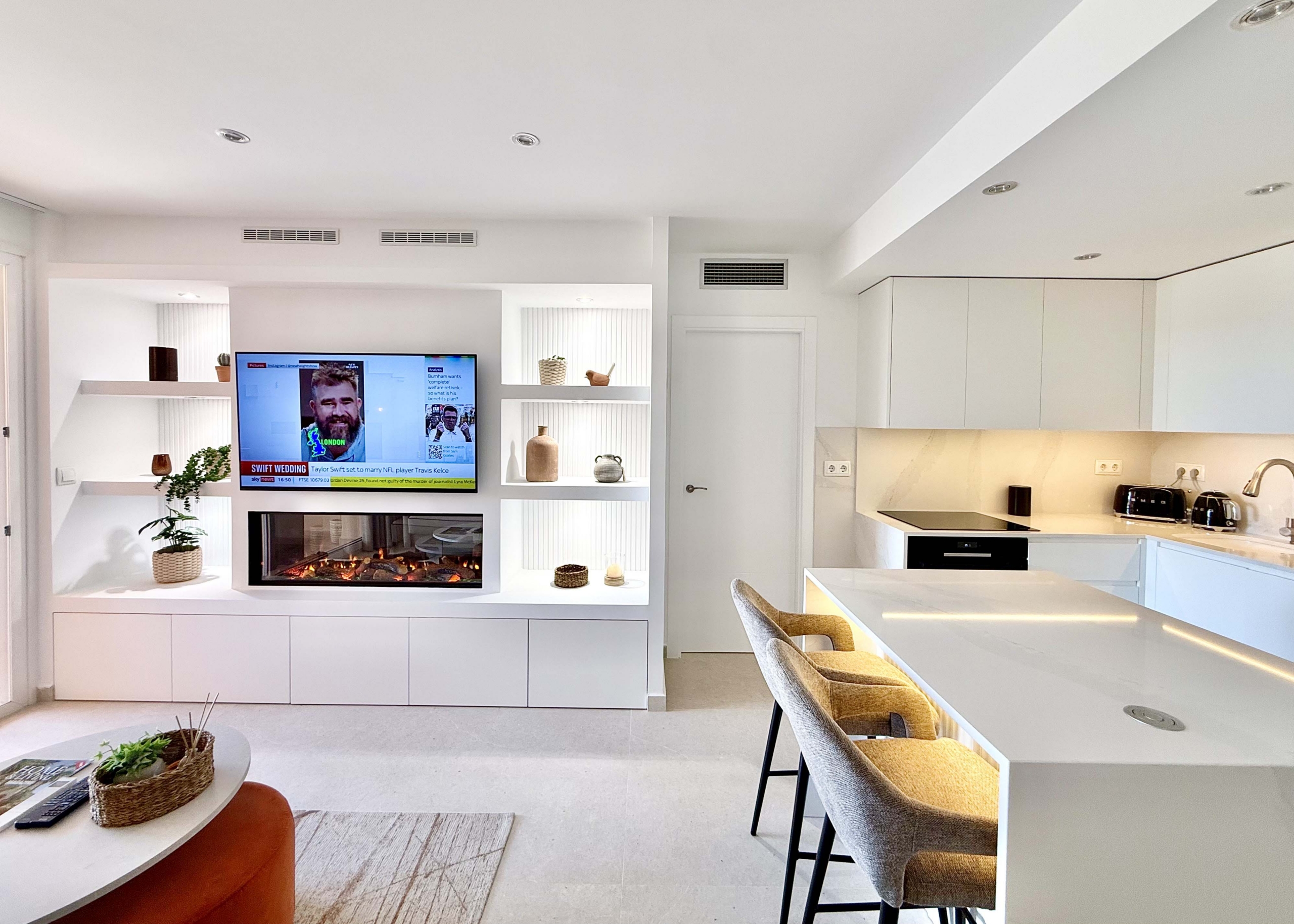 Modern living room in an upgraded one-bedroom apartment for sale on Mar Menor Golf Resort with golf views, exclusively marketed by Levante Properties.