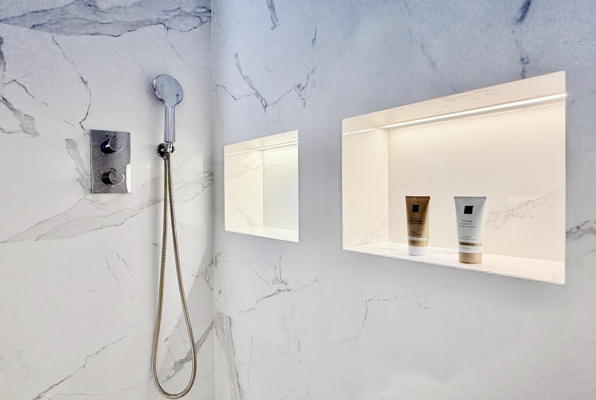 Modern en-suite shower room in upgraded Mar Menor Golf Resort apartment.