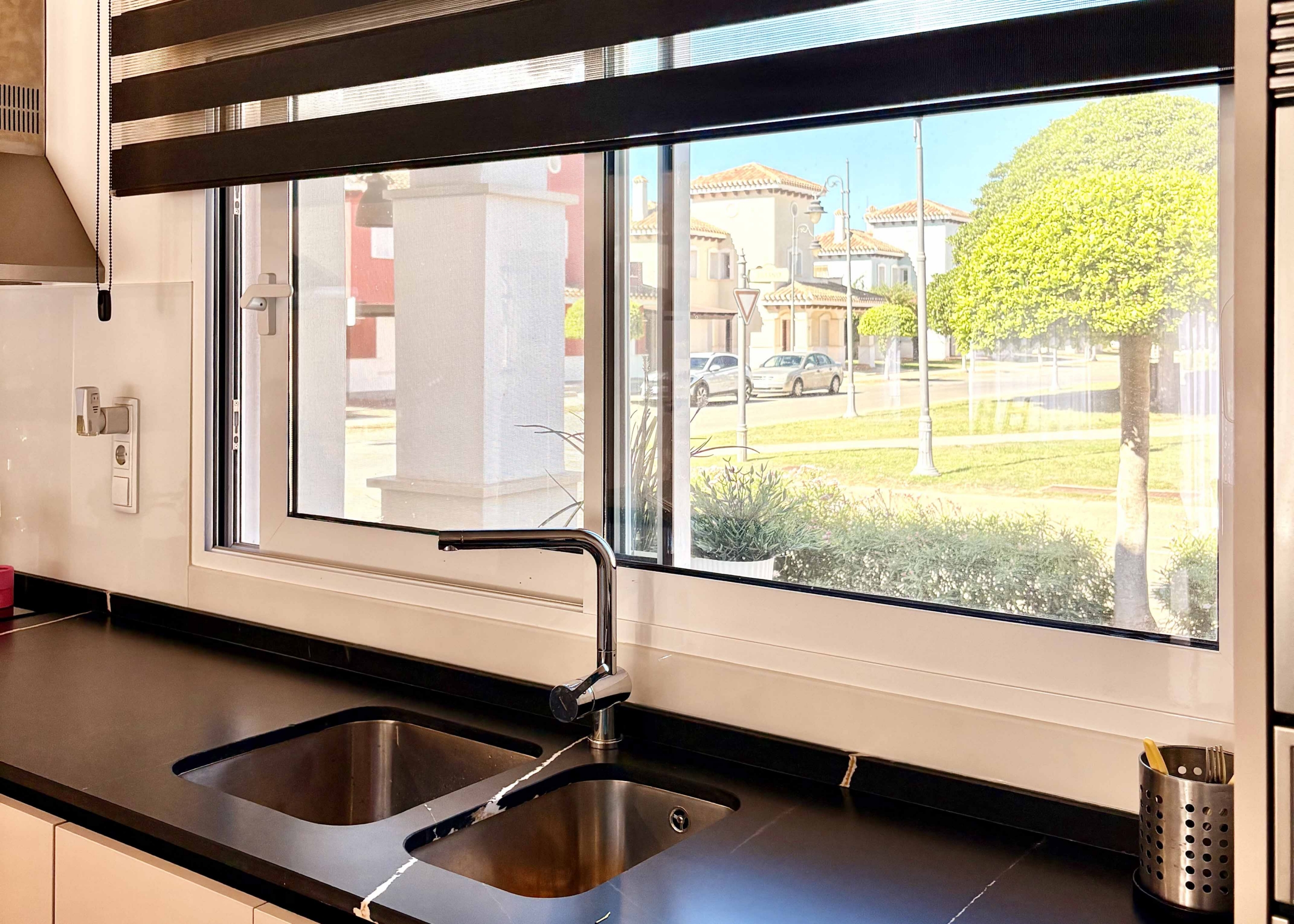 Modern open-plan kitchen in Baron villa on Mar Menor Golf Resort