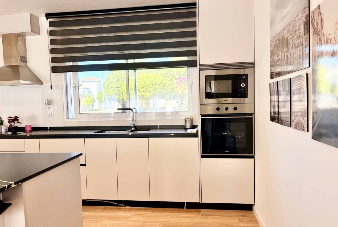 Modern open-plan kitchen in Baron villa on Mar Menor Golf Resort