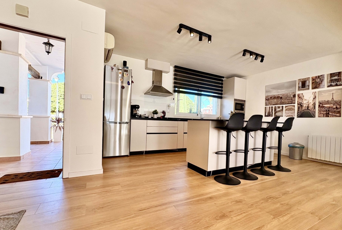 Modern open-plan kitchen in Baron villa on Mar Menor Golf Resort