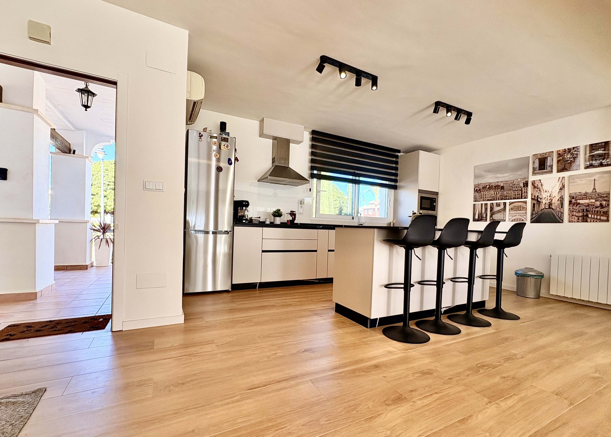 Modern open-plan kitchen in Baron villa on Mar Menor Golf Resort