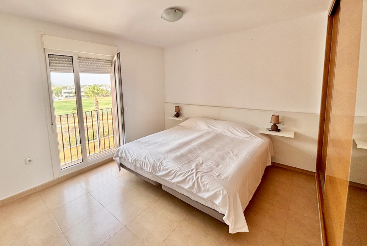 Master bedroom with golf course views in a Boulevard apartment on Mar Menor Golf Resort