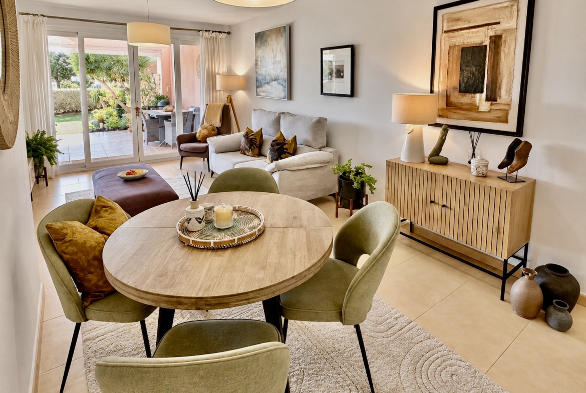 Open-plan living and dining room with terrace access at Mar Menor Golf Resort