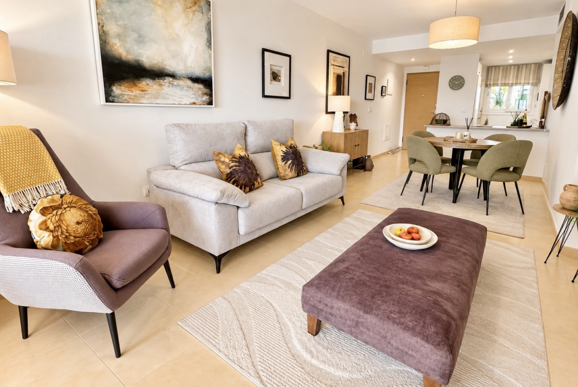Open-plan living and dining room with terrace access at Mar Menor Golf Resort