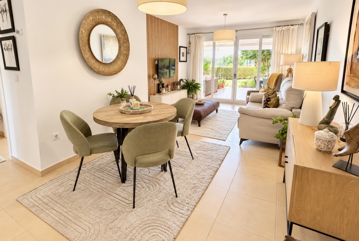 Open-plan living and dining room with terrace access at Mar Menor Golf Resort