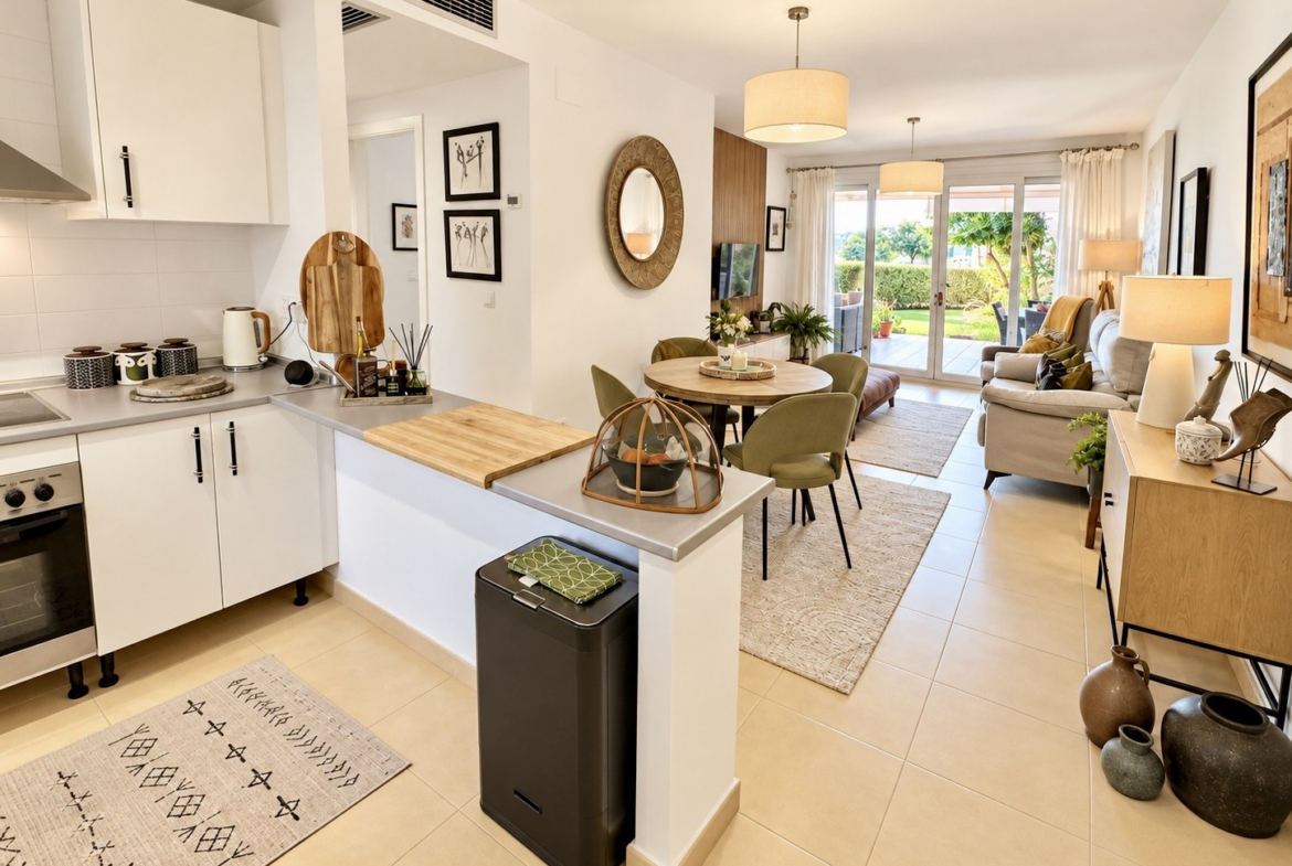 Open-plan living and dining room with terrace access at Mar Menor Golf Resort