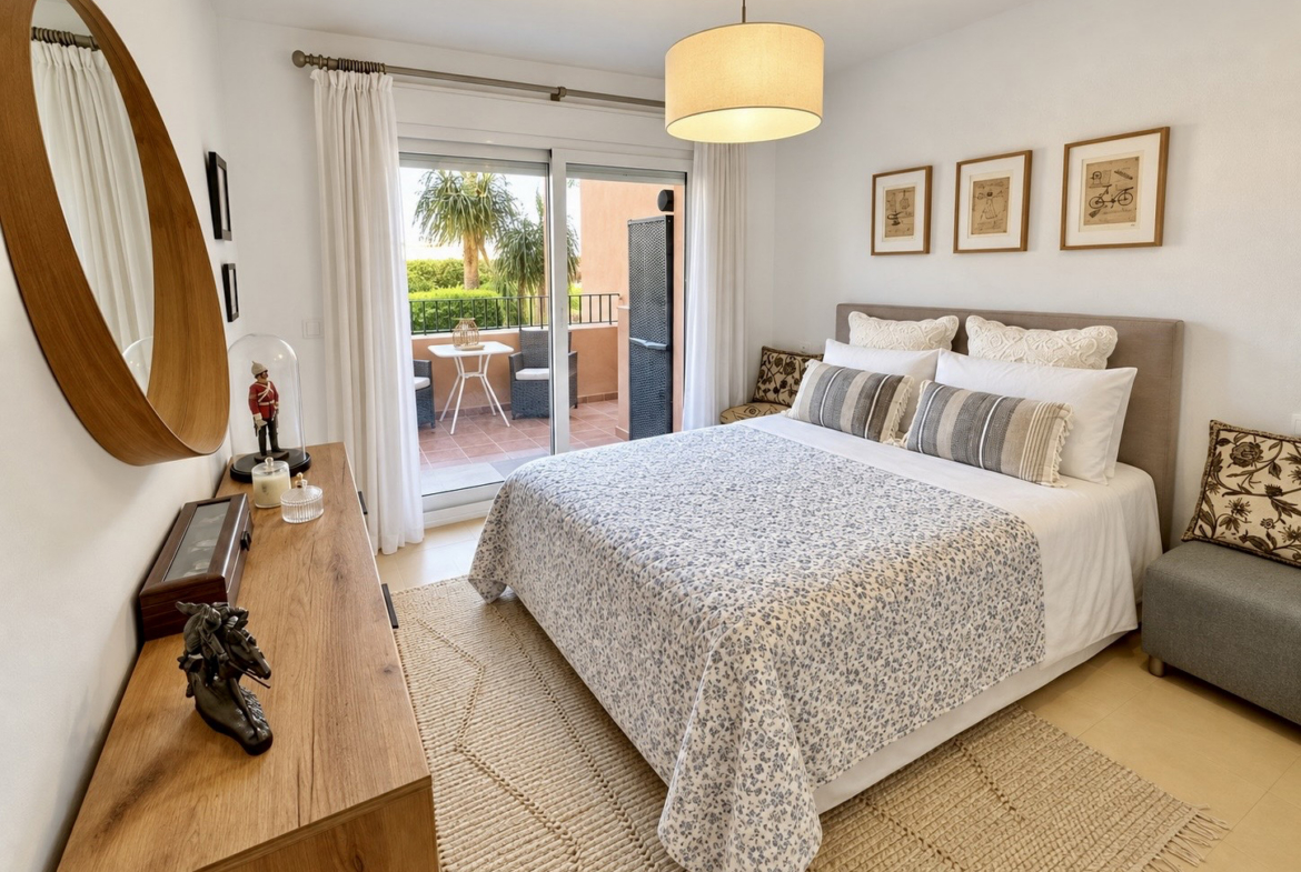 Second bedroom with fitted wardrobes and access to a spacious terrace at Mar Menor Golf Resort