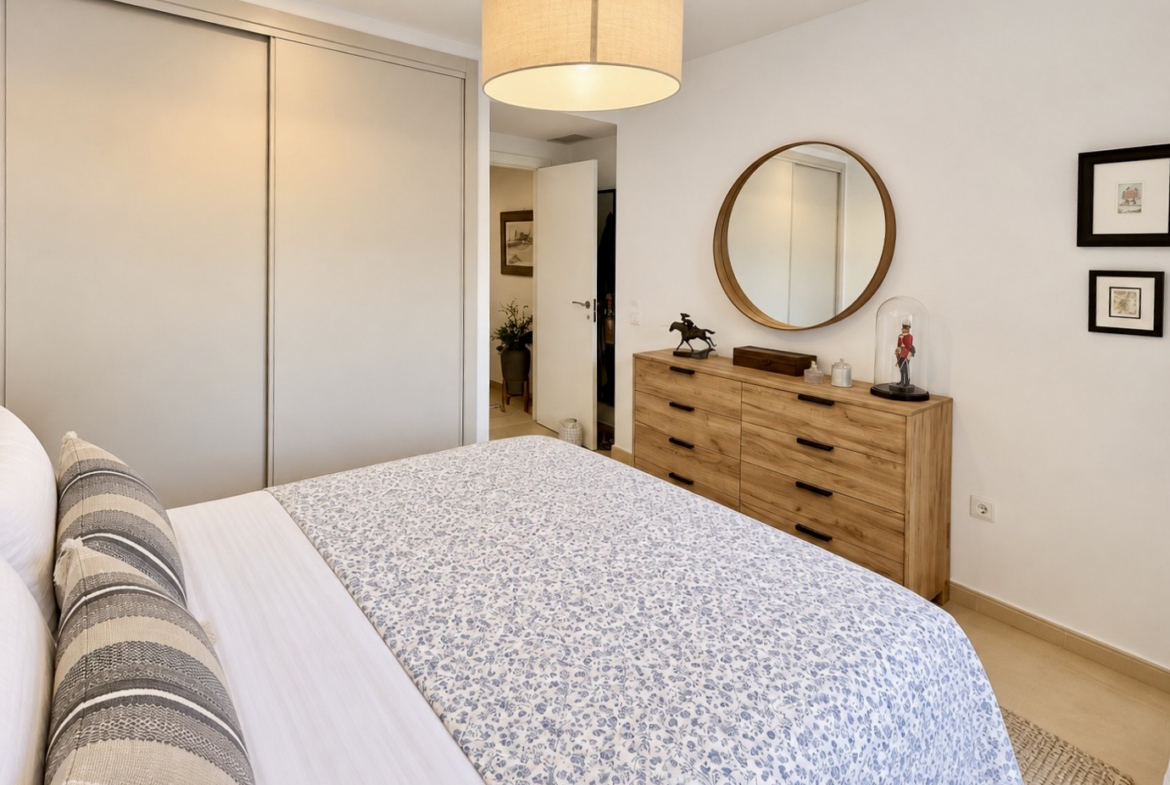 Second bedroom with fitted wardrobes and access to a spacious terrace at Mar Menor Golf Resort