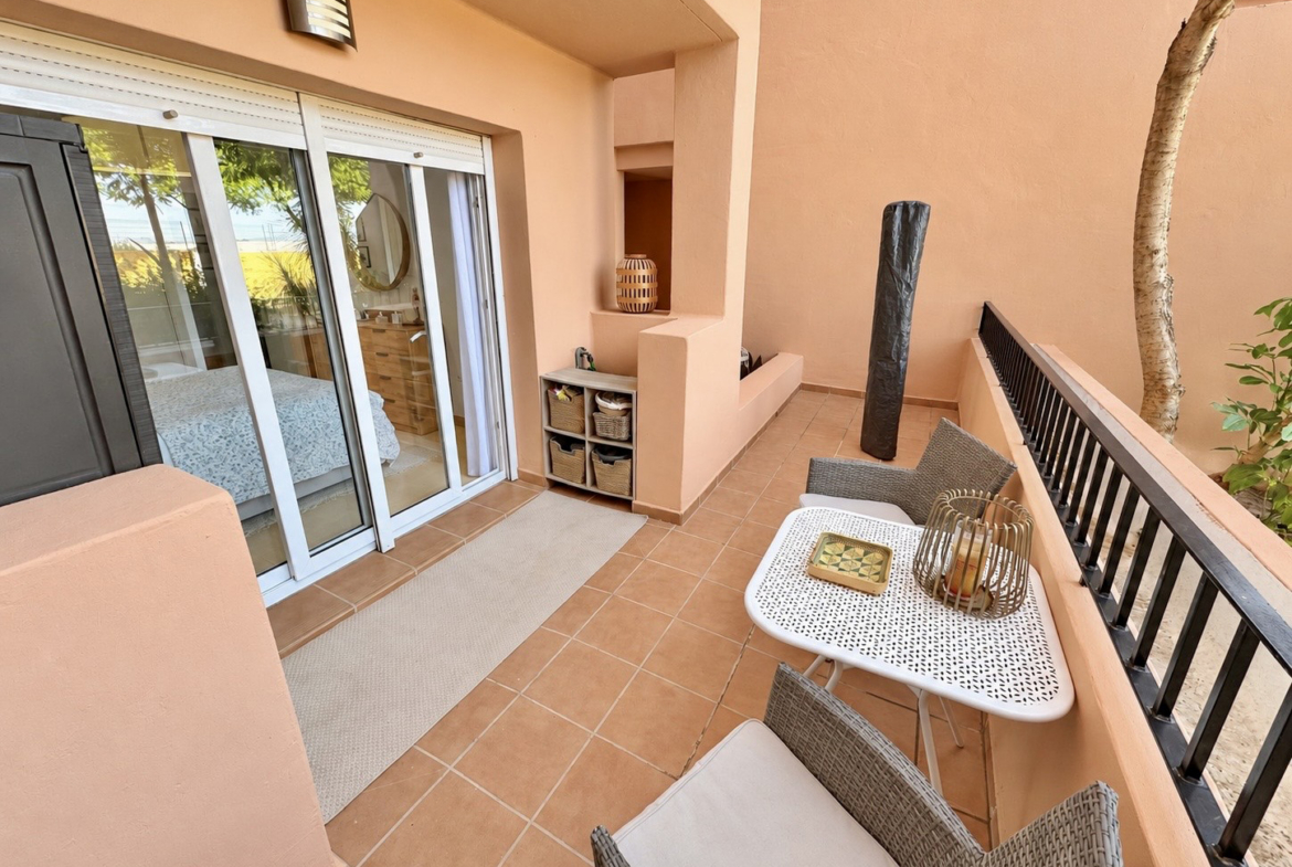 Ground floor apartment terrace overlooking landscaped communal gardens at Mar Menor Golf Resort