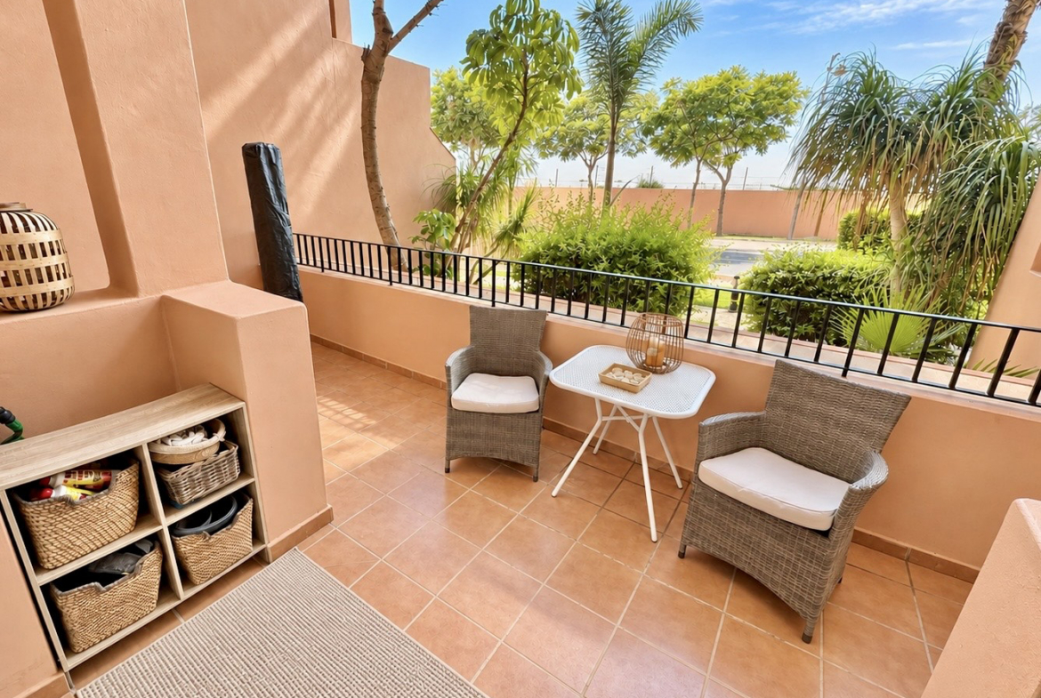 Ground floor apartment terrace overlooking landscaped communal gardens at Mar Menor Golf Resort